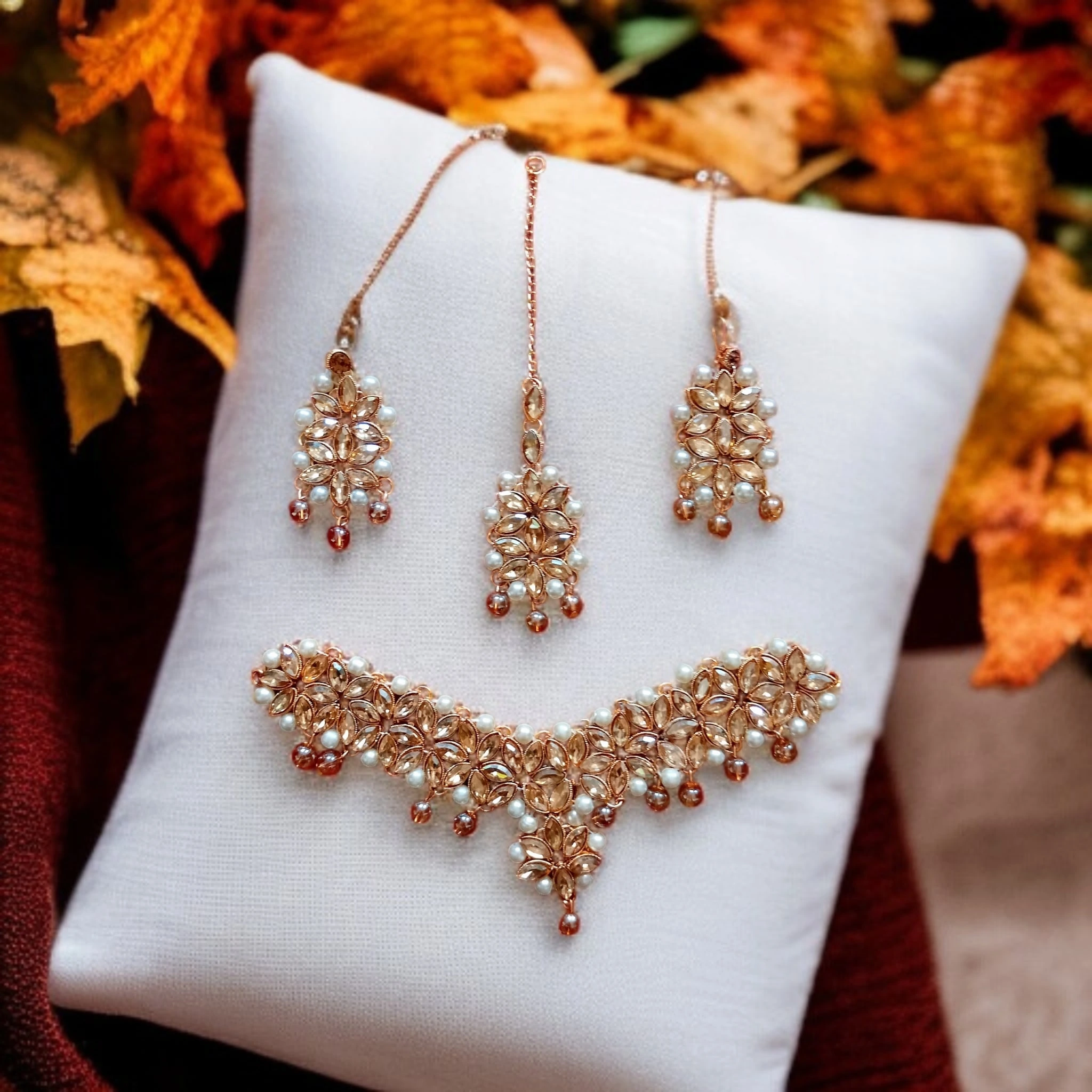 Buy Golden colour jewellery set with necklace , earrings and tikka at best price in pakistan